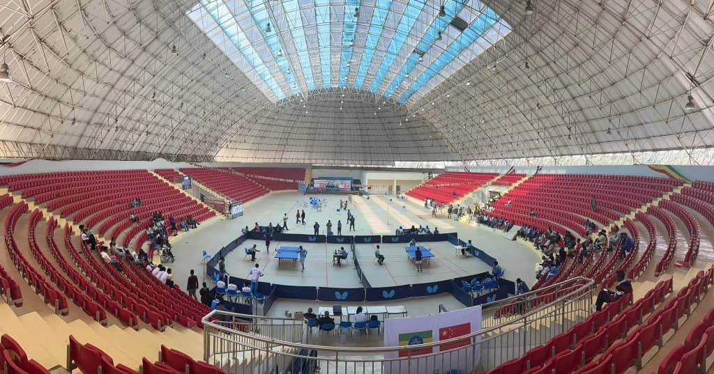 Ethiopia National Table Tennis Championship venue with red seating and multiple tables